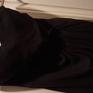 A strapless draped gown